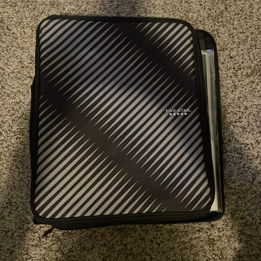 Five star 3 ring binder/folder. Black and grey.
